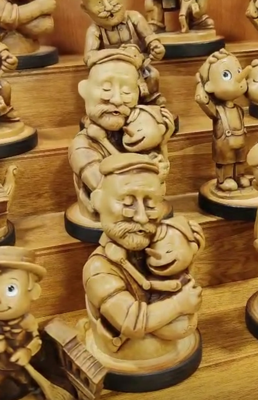 Pinocchio abrazo Geppetto
