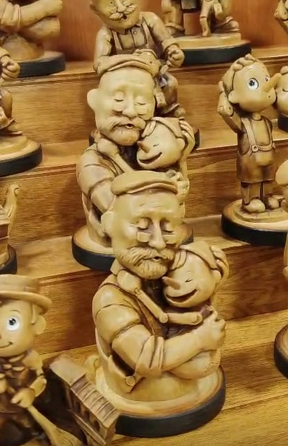 Pinocchio abrazo Geppetto