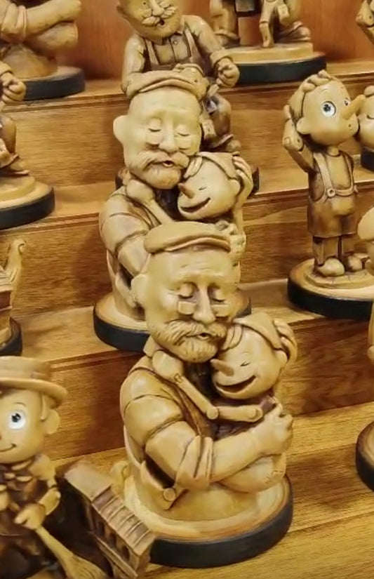 Pinocchio abrazo Geppetto
